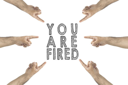 You are fired. Hr concept. Hands pointing the text you're fired.