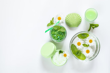 Spa products. Flat lay green color concept.