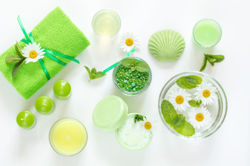 Spa products. Flat lay green color concept.