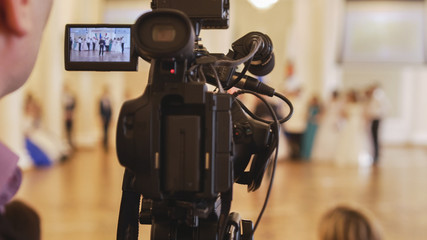 Videographer shoots people in vintage ball costumes at the historical ball