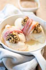 Black pudding & apple stuffed chicken breasts wrapped in bacon with a roast chicken gravy