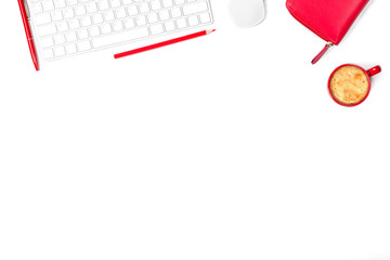 Beautiful minimal mockup in red and white colors. Modern keyboard, mouse, pencil, pen, small cup of coffee and purse on white background. Top view.