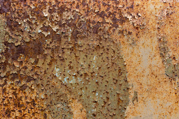 Corrosion of rust and color on old metal surfaces.