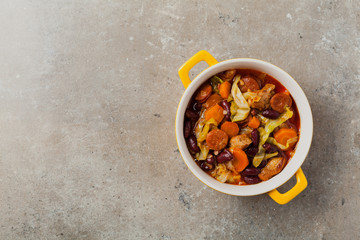 Traditional portuguese goulash with cabbage, beans and ribs.