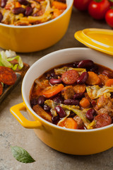 Traditional portuguese goulash with cabbage, beans and ribs.