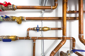 Cooper pipes of gas heating system in the boiler room