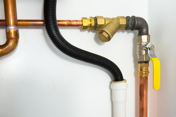 Cooper pipes of gas heating system in the boiler room