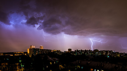Naklejka na ściany i meble Thunderstorm over the city