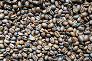 Full frame shot of the roasted coffee beans, coffee bean texture for background.