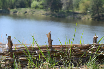 fence near the lake