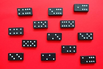 Dominos on red background.