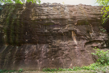 Fototapeta premium Texture of the natural sandstone cliff in the jungle, Phu Sing, Bueng Kan, Thailand