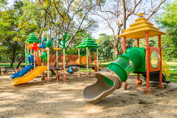 Outdoor children playground in green nature city park