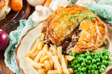 Homemade beef stew pie with french fries