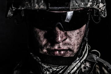 Cropped close up portrait of US special operations forces soldier, marine raider, modern combatant...