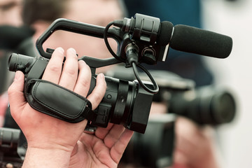 Camera at media conference