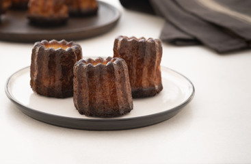 Caneles de bordeaux - traditional French sweet dessert