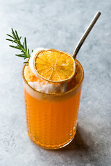 Dried Orange Cocktail with Foam, Rosemary and Metal Straw.