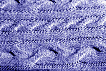 Knitting pattern in blue color.