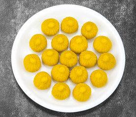 Indian Sweet Food Modak Also Know as Laddu, Khoya, khova Modak, Kozhakkatta, Modhaka, Kadubu, Modhakam, Kozhakkattai, Kudumu. Made up of Coconut And Jaggery, Rice Flour, Wheat with Khava