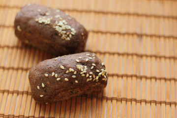Fototapeta na wymiar fresh mini bread on wooden backround