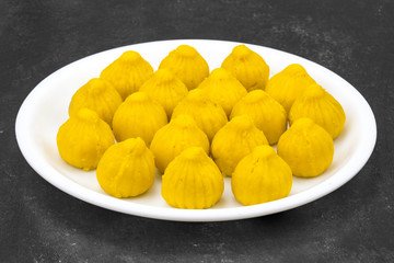 Indian Sweet Food Modak Also Know as Laddu, Khoya, khova Modak, Kozhakkatta, Modhaka, Kadubu, Modhakam, Kozhakkattai, Kudumu. Made up of Coconut And Jaggery, Rice Flour, Wheat with Khava