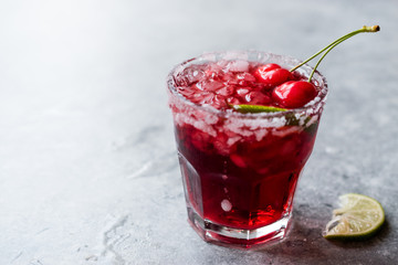 Cherry Margarita Cocktail with Tequila, Lime, Salt, Cherry Juice and Crushed Ice.