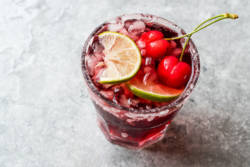 Cherry Margarita Cocktail with Tequila, Lime, Salt, Cherry Juice and Crushed Ice.