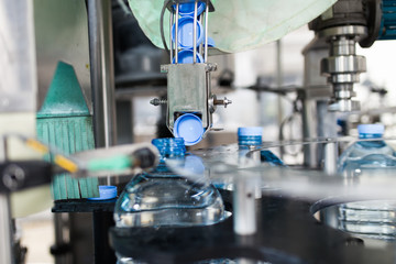 Bottling plant - Water bottling line for processing and bottling pure mineral carbonated water into bottles and gallons.