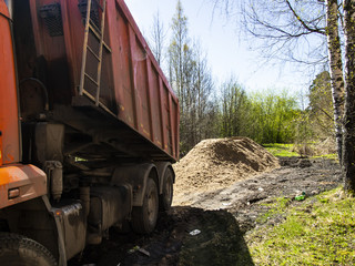 large dump truck on unloading