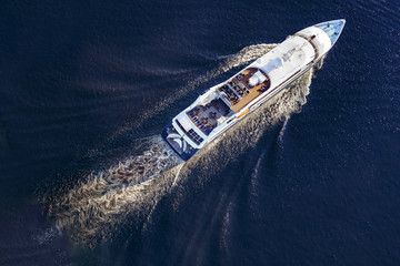 Cruise ship sailing on the sea.  Top view. Concept: of a journey by sea