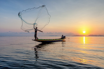Songkhla ,Thailand - May 15,2018 : Fishermen are trying to catch fish in the lake.