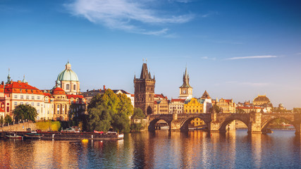 Fototapeta na wymiar Scenic spring sunset aerial view of the Old Town pier architecture and Charles Bridge over Vltava river in Prague, Czech Republic