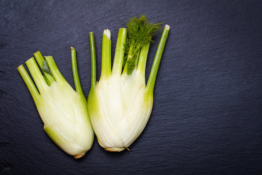 Healthy food Organic fennel on black slate stone plate