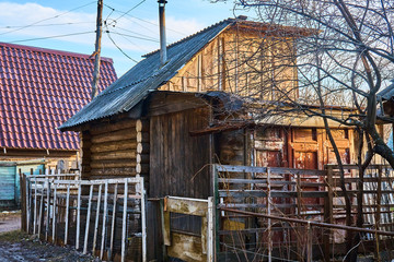 Old log building with dilapidated walls