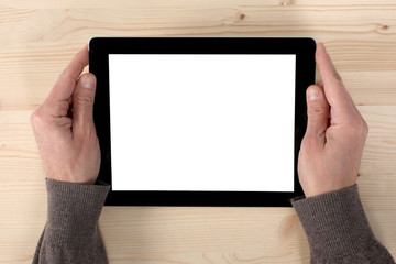 man's hand holding a tablet with copy space and clipping path.