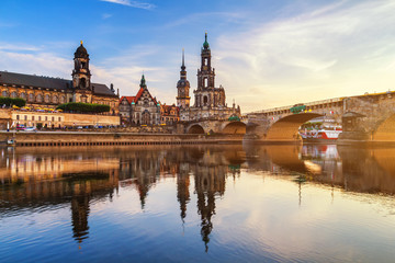 Fototapeta na wymiar Augustus Bridge (Augustusbrucke) and Cathedral of the Holy Trinity (Hofkirche) over the River Elbe in Dresden, Germany, Saxony.
