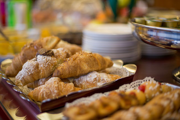 Sweet brakfast. Close-up of a tray with croissants