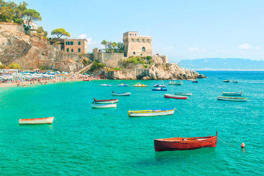 fishing boats near small european beach