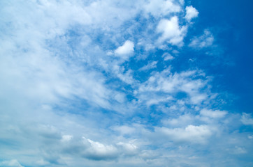 white fluffy clouds in the blue sky