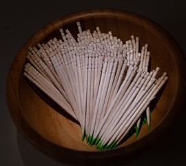 toothpick in a wooden bowl