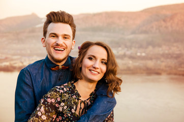 couple in love on the background of hills