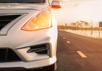 Car in nature on an asphalt road - Front view