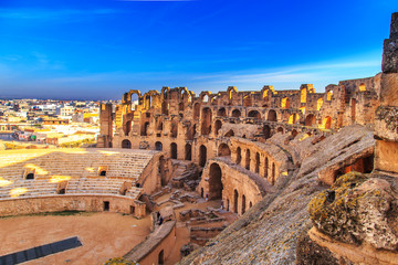 The ruins of the amphitheater in El Jeme, Tunisia. - obrazy, fototapety, plakaty