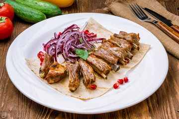 Kebab from lamb ribs