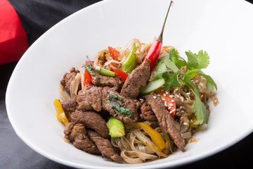 Thai spicy noodles dish with meat