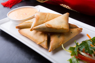 Fried prepared samosas