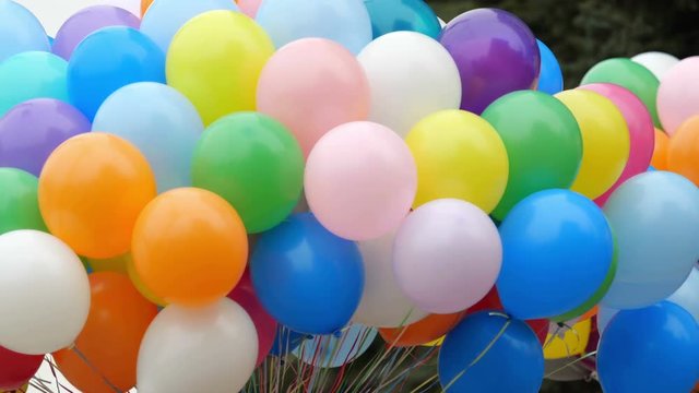Festive color helium balloons.  
