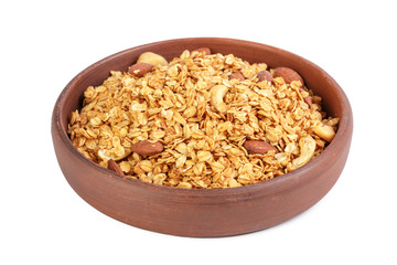 Bowl of whole grain muesli isolated on white background