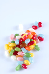 group of colored candies isolated on white background